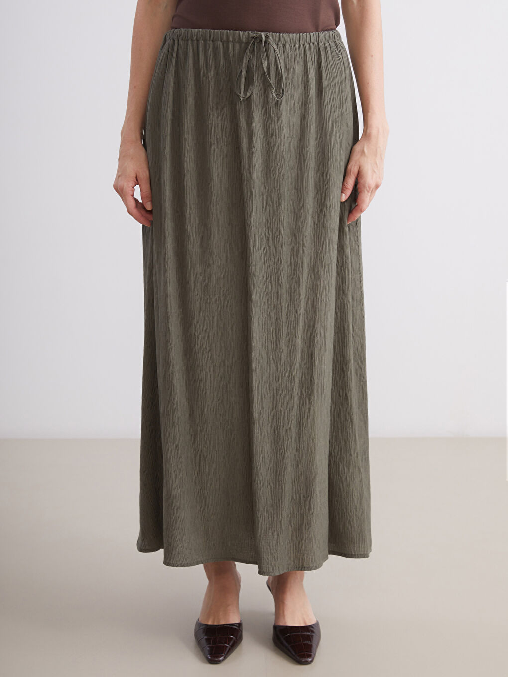 Haki Beli Lastikli Dokulu Kloş Etek-1