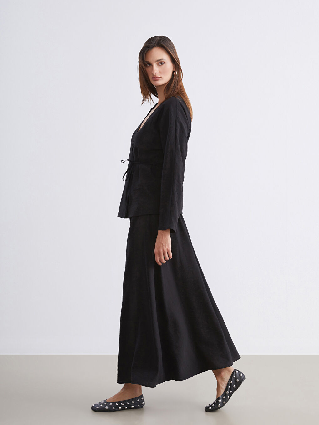 Siyah Beli Lastikli Dokulu Etek