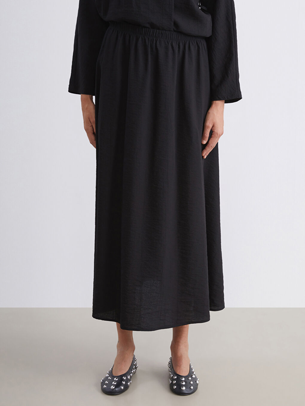 Siyah Beli Lastikli Dokulu Etek-1