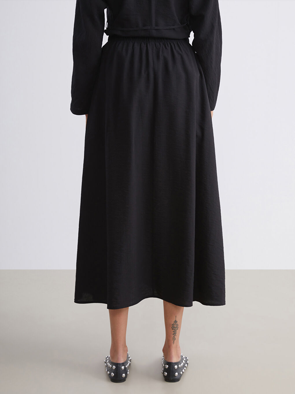 Siyah Beli Lastikli Dokulu Etek-3