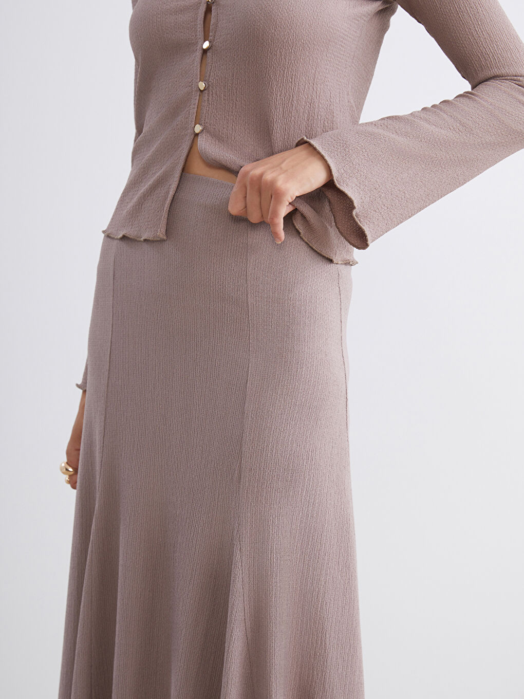 Bej Beli Lastikli Dokulu Pileli Etek-2