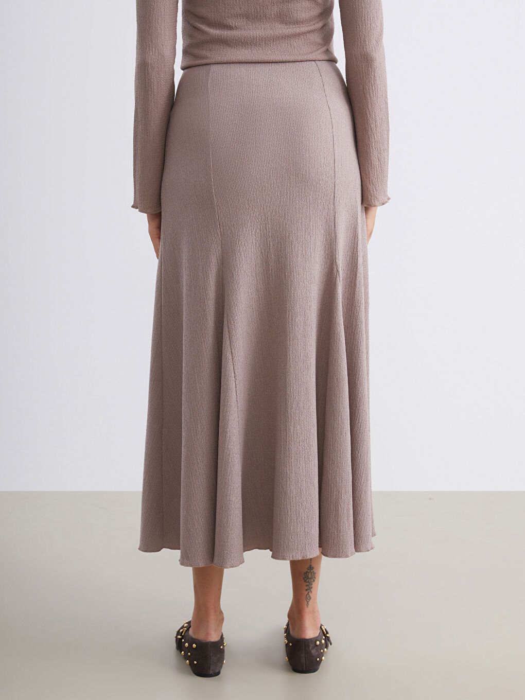 Bej Beli Lastikli Dokulu Pileli Etek-3