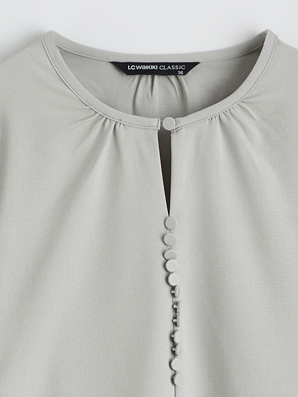 Дөңгелек жағалы бүрмелі блузка-5