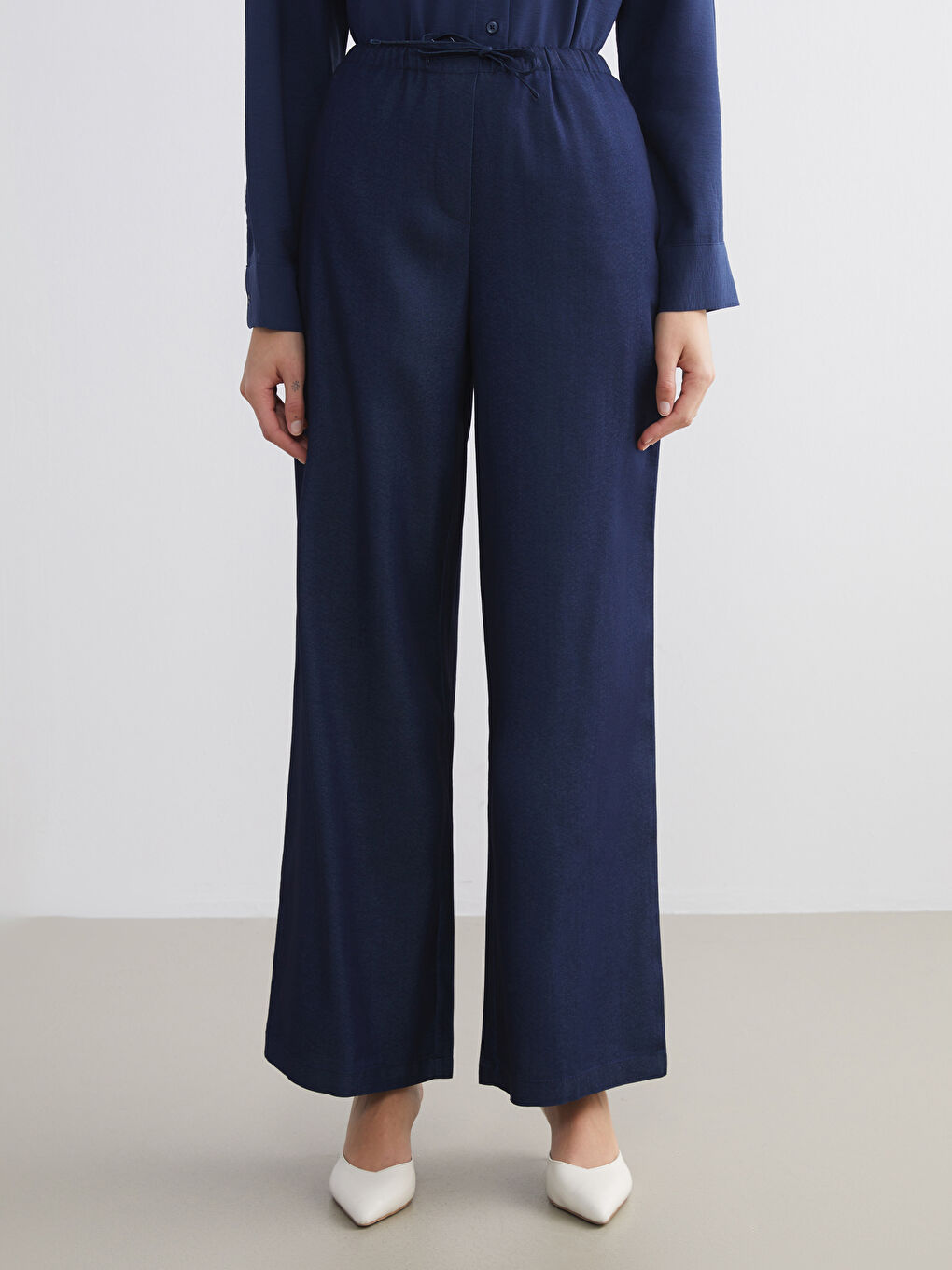 جينز نساء بسروال واسع وخصر مطاطي-1