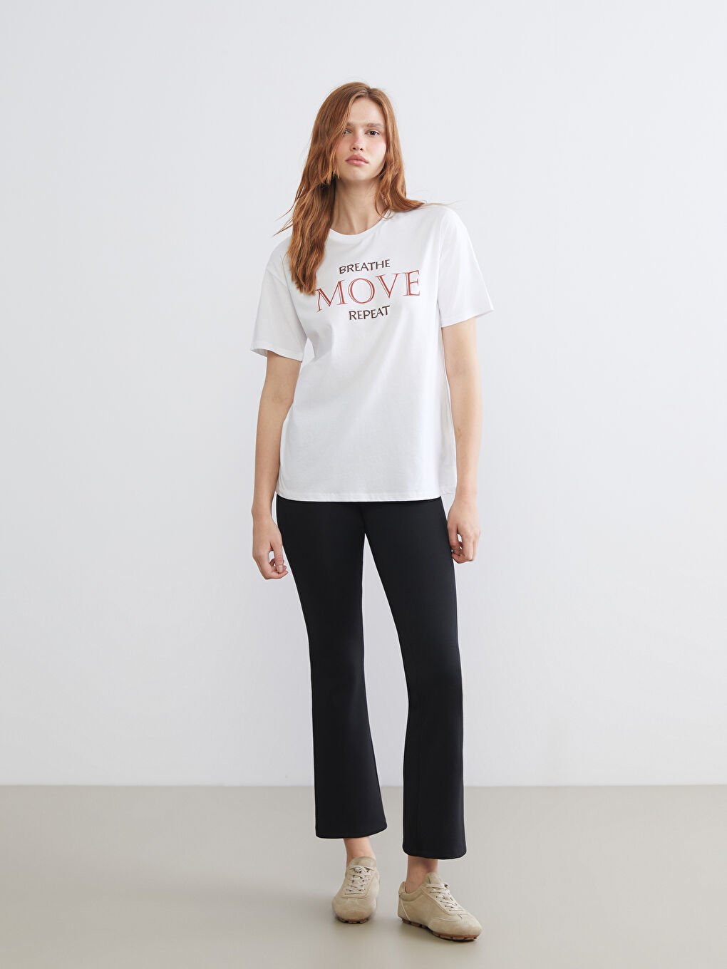 ქალის პრინტიანი სპორტული მაისური მრგვალი ყელით-1