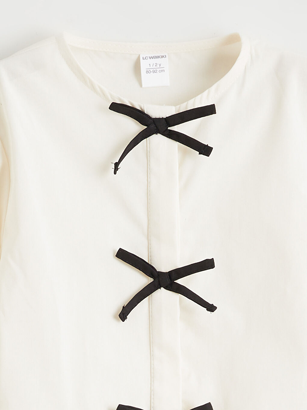 Ekru Bisiklet Yaka Fiyonk Detaylı Kız Bebek Gömlek-1