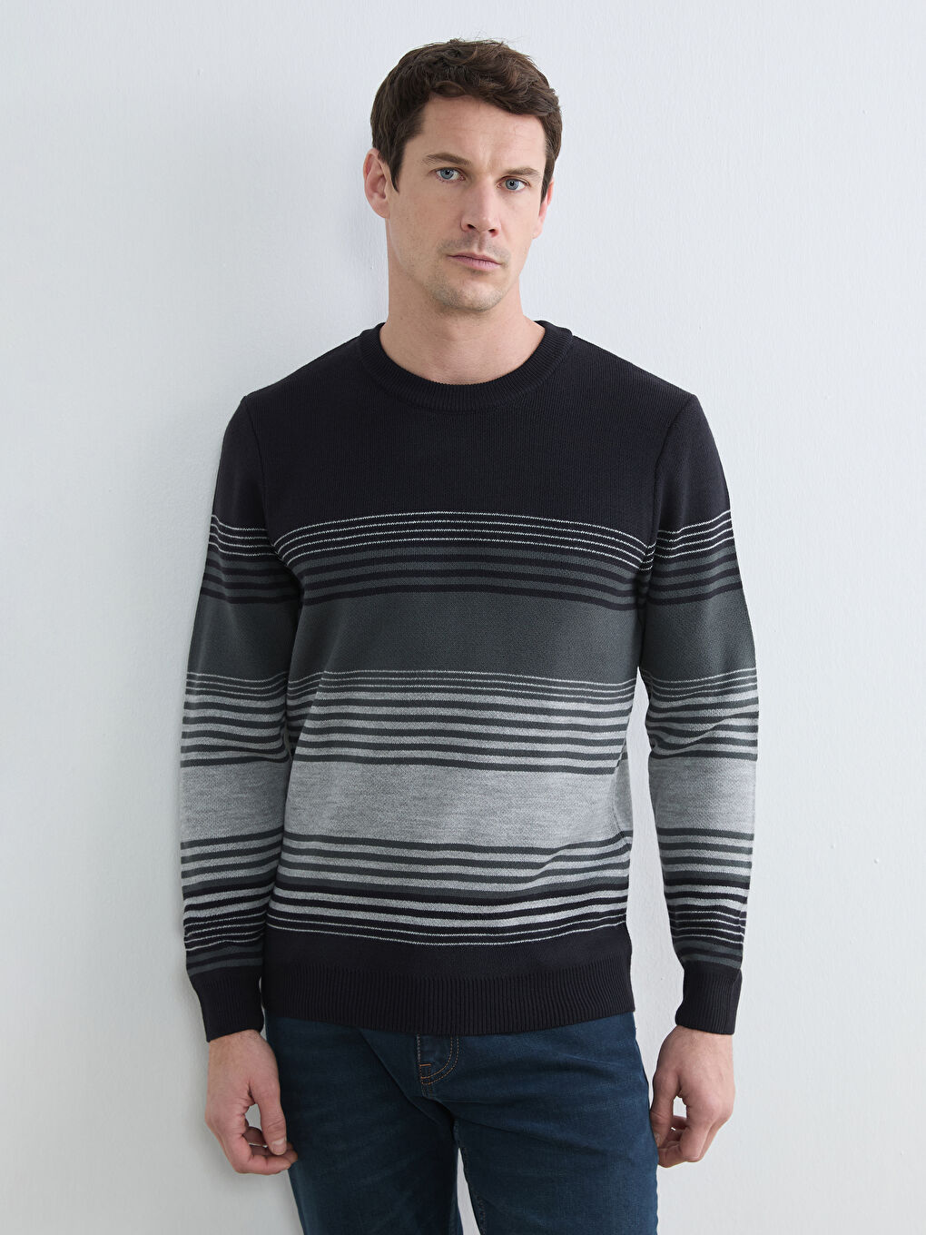 Striped crew-neck knit sweater for men.
