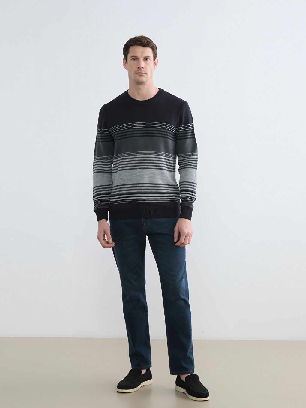 Striped crew-neck knit sweater for men.-1