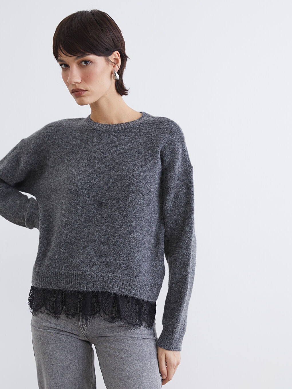 Elevate your style with our crew neck knit sweater, delicately accented with lace.-3