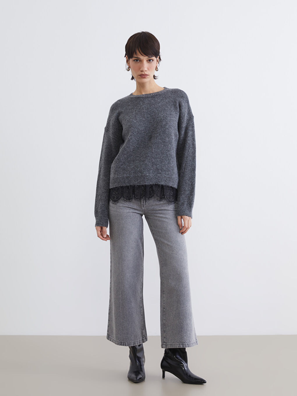 Elevate your style with our crew neck knit sweater, delicately accented with lace.-5