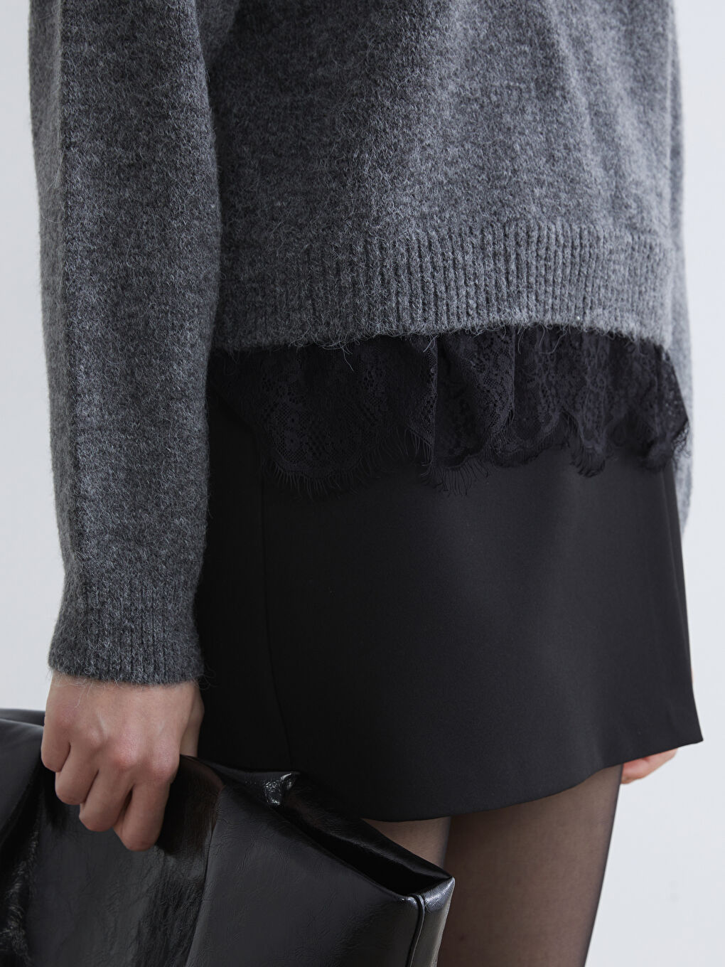 Elevate your style with our crew neck knit sweater, delicately accented with lace.-6