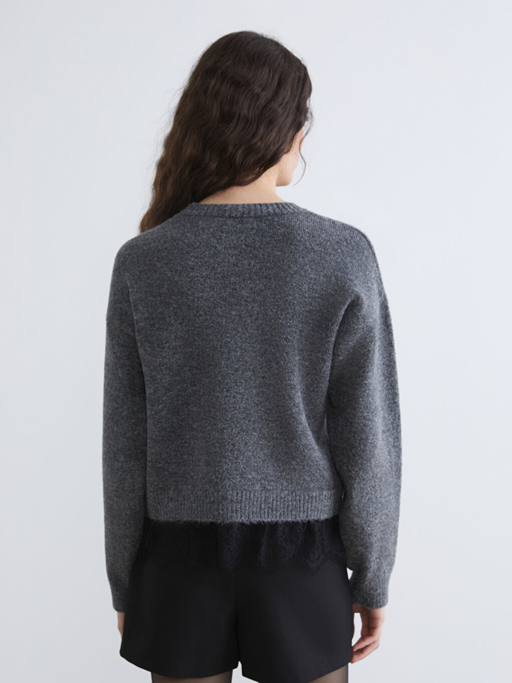 Elevate your style with our crew neck knit sweater, delicately accented with lace.-8