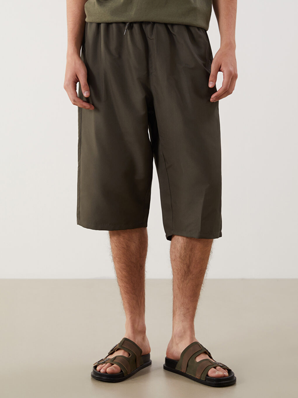 ژێر ئەژنۆ شۆرتی مەلەکردن بۆ پیاوان-1