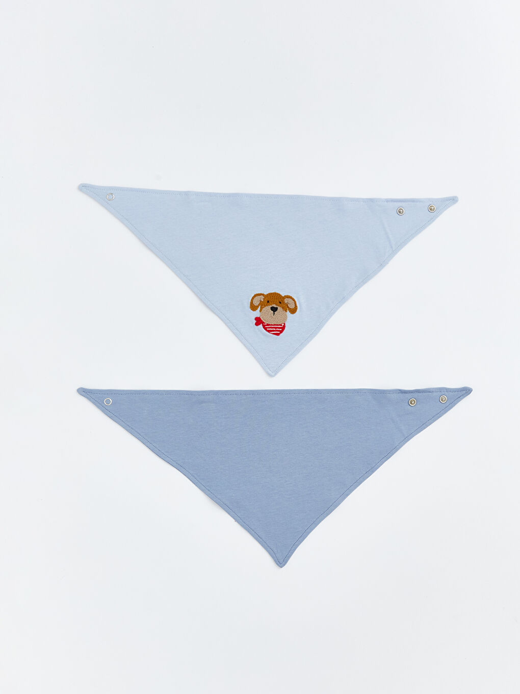 Two-pack of printed baby boy bibs.