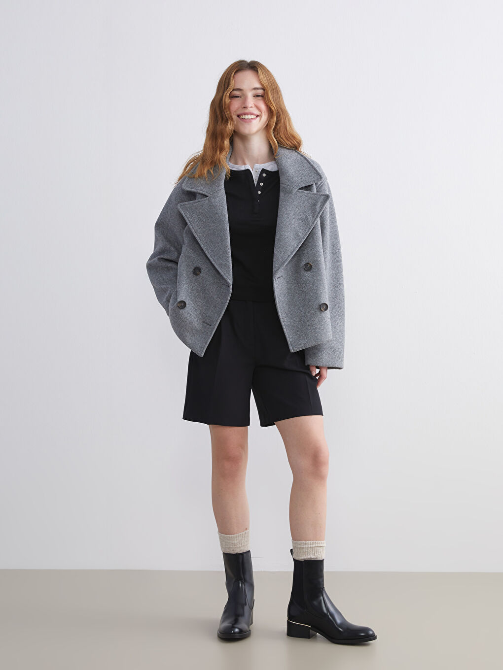 پۆشاکی سەرەوەی پشمی تێکەڵاو خۆڵه‌مێشی ژن-1