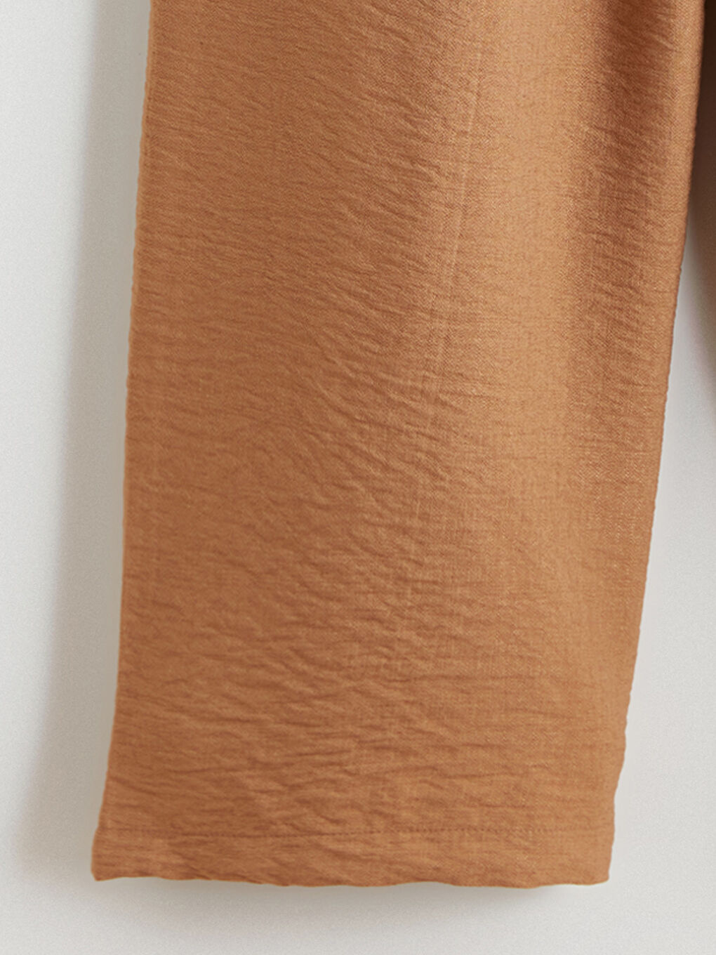 ქალთა თავისუფალი ჭრილის ნაკეციანი შარვლები-5