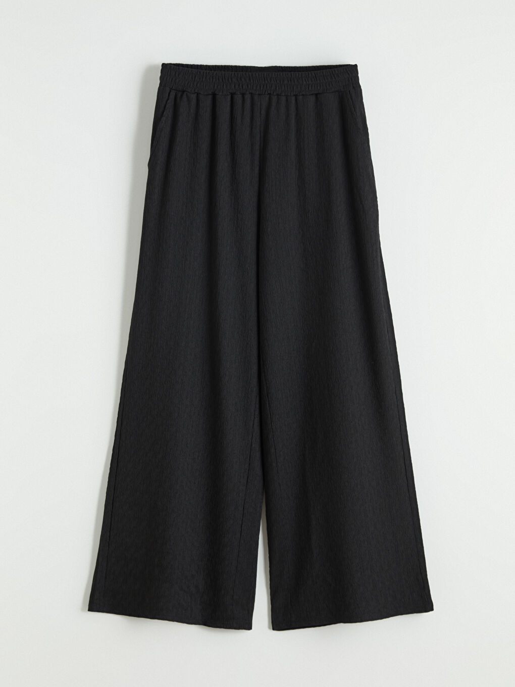 Textured wide-leg women's trousers with an elasticated waist.-4