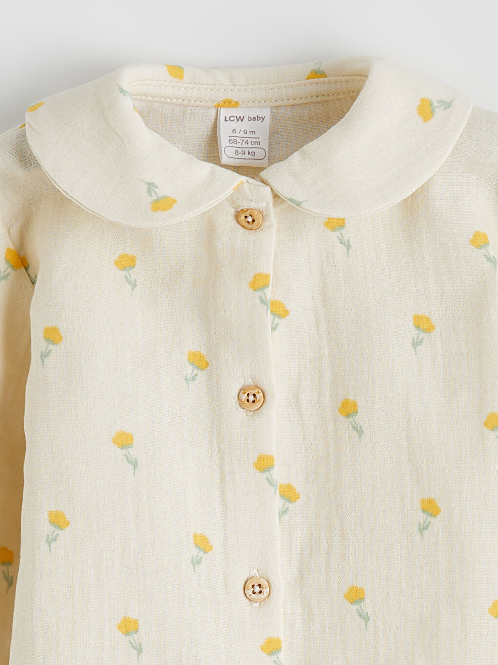 Ekru Fırfırlı Çiçek Baskılı Müslin Kız Bebek Tulum-1