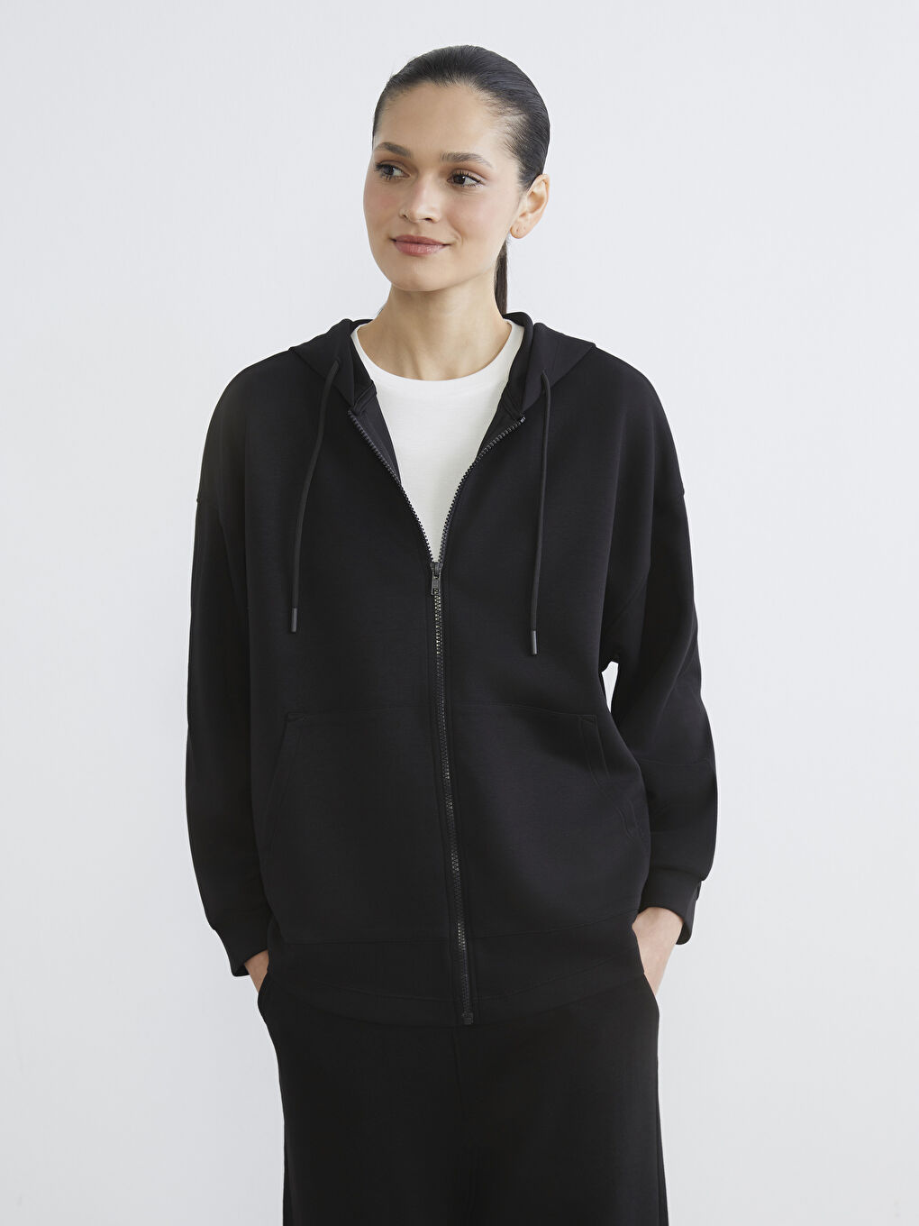 ქალის ფართო ზომის ზიპიანი ჰუდი