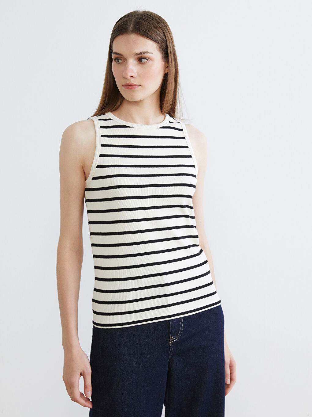 Striped women's tank top with a crew neck.