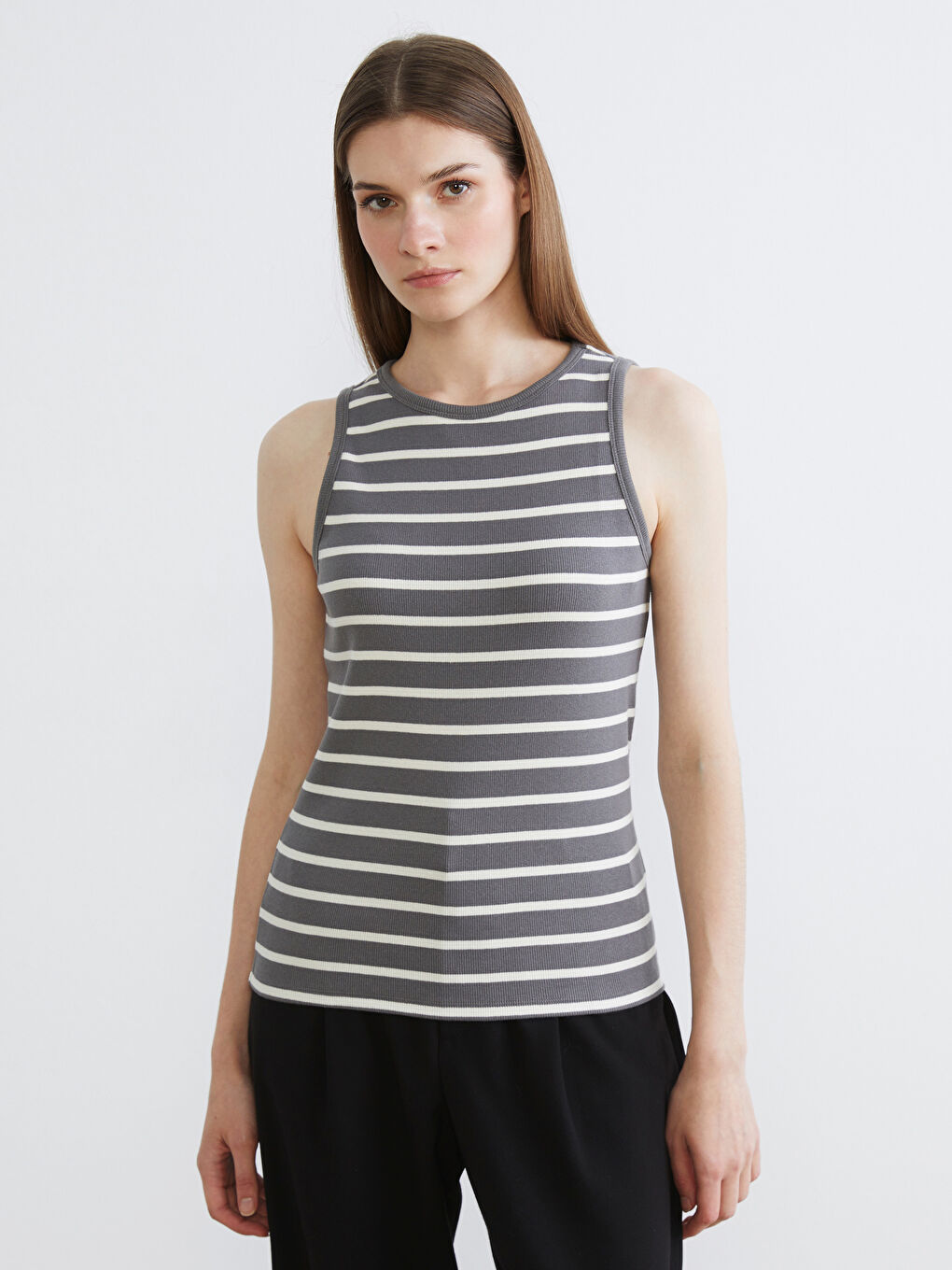Striped women's tank top with a crew neck.