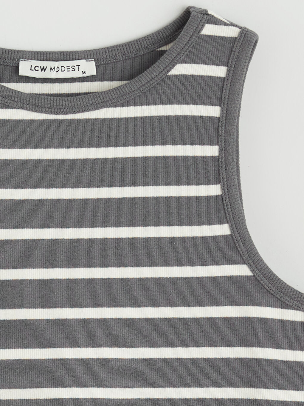 Striped women's tank top with a crew neck.-5