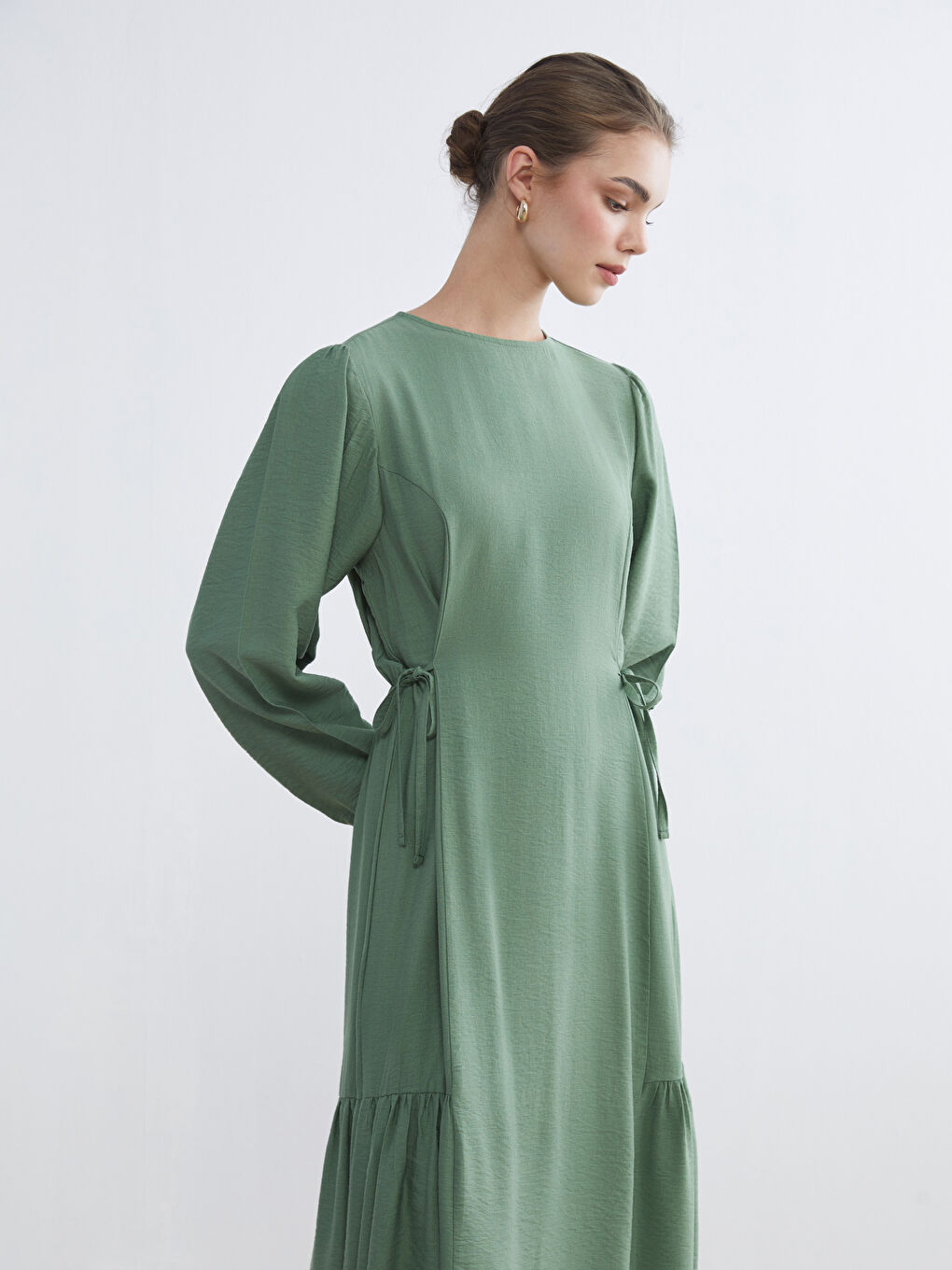 Gathered dress with a crew neck.