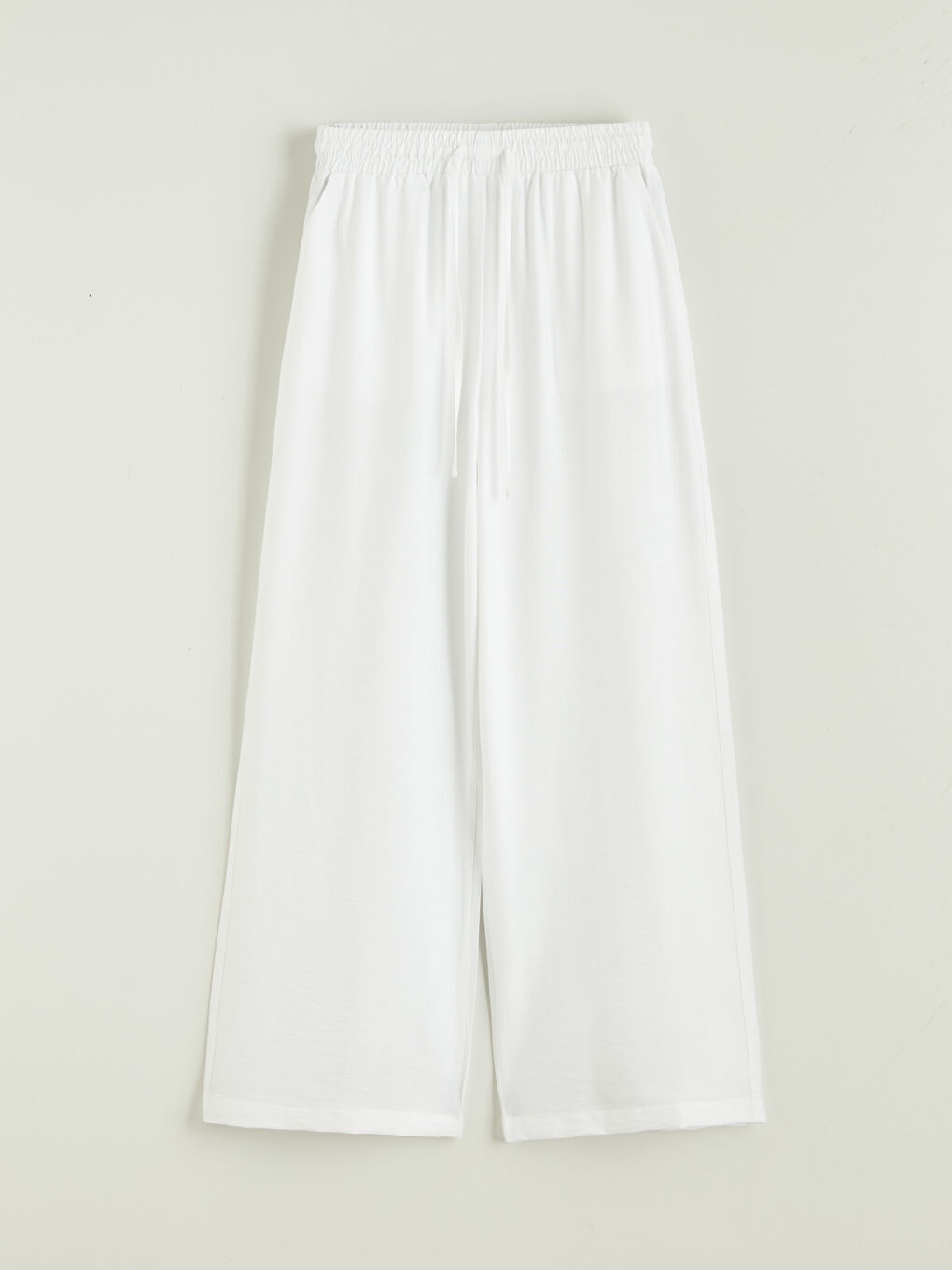 Effortless elegance meets everyday comfort in our wide-leg trousers with a flexible waistband.-4