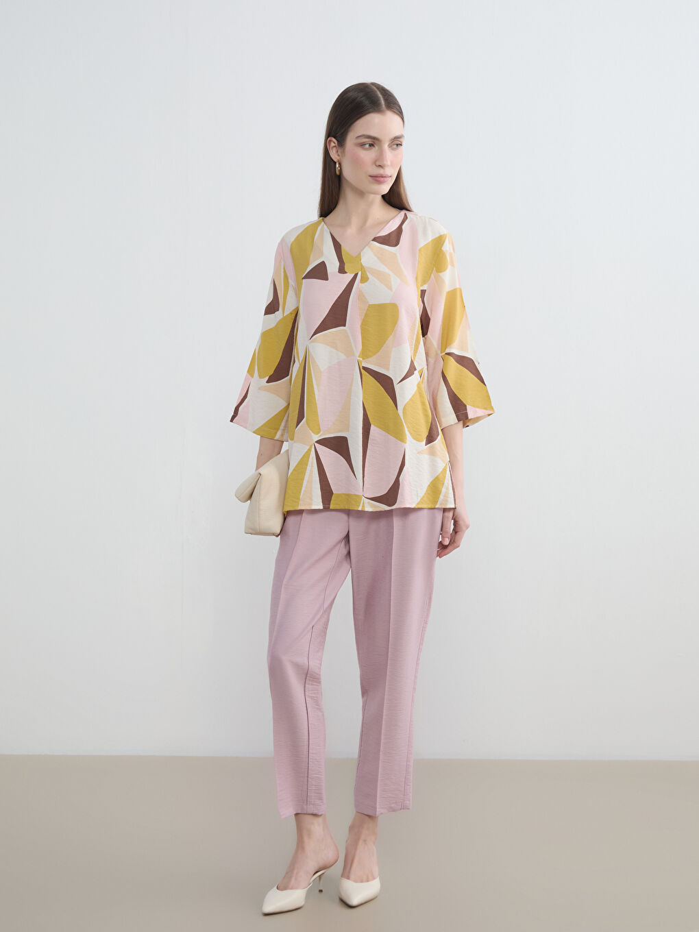 پانتۆڵی ئافرەتان بە کەمەری لاستیکی و فیتی گیزەر