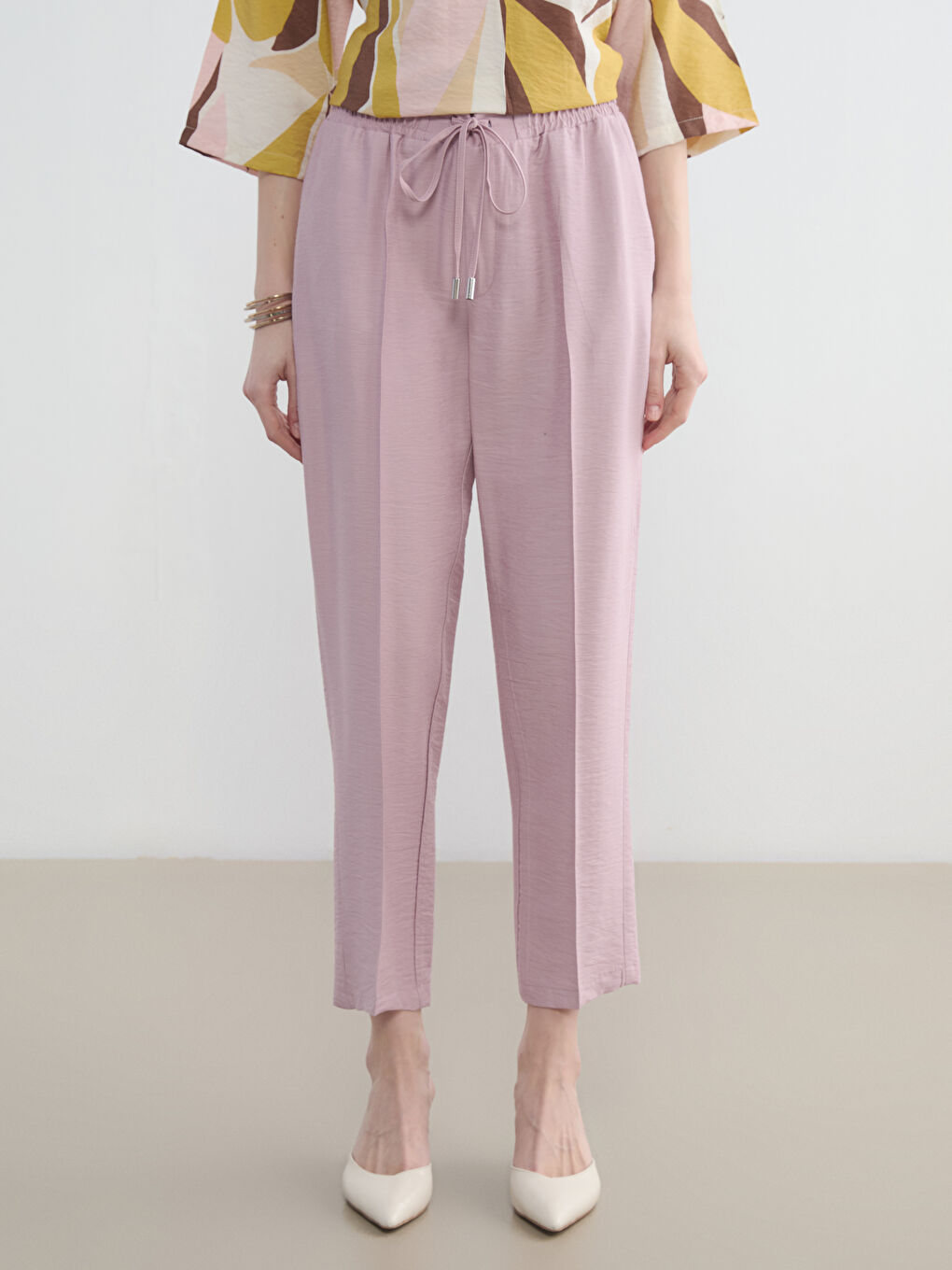 پانتۆڵی ئافرەتان بە کەمەری لاستیکی و فیتی گیزەر-1