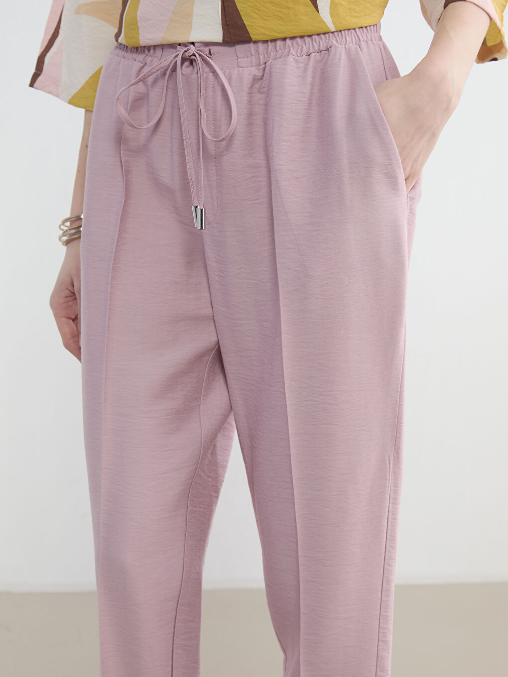 پانتۆڵی ئافرەتان بە کەمەری لاستیکی و فیتی گیزەر-2