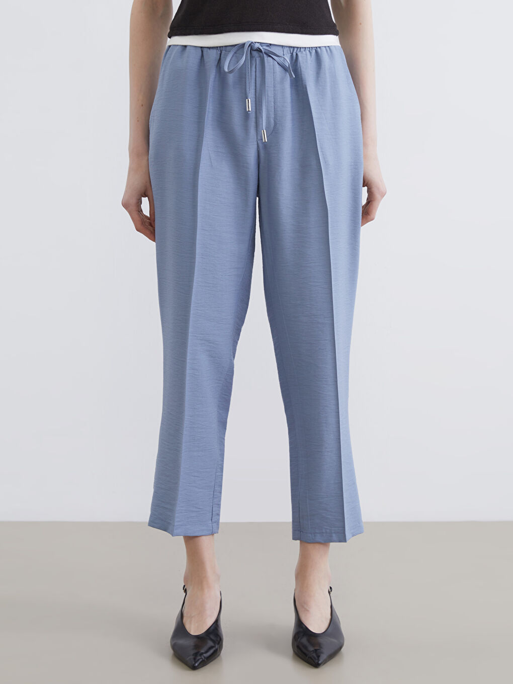 پانتۆڵی ئافرەتان بە کەمەری لاستیکی و فیتی گیزەر-1