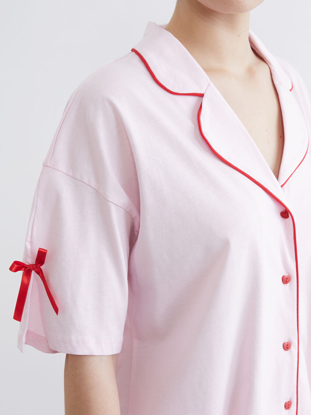 طقم بيجاما وردي امرأة-2