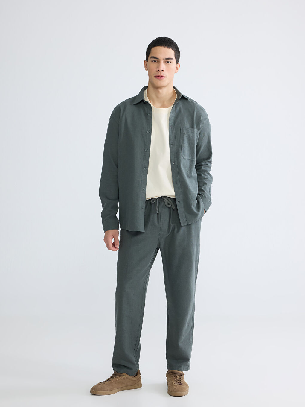 კომფორტული ჭრა თეთრეულის ეფექტი მამაკაცებისთვის შარვალი