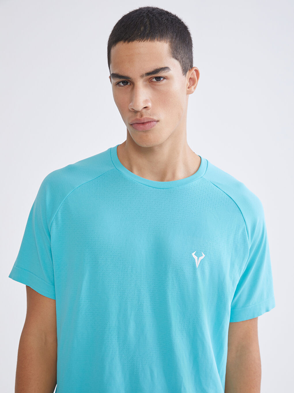 تيشيرت رياضي فيروزي رجل
