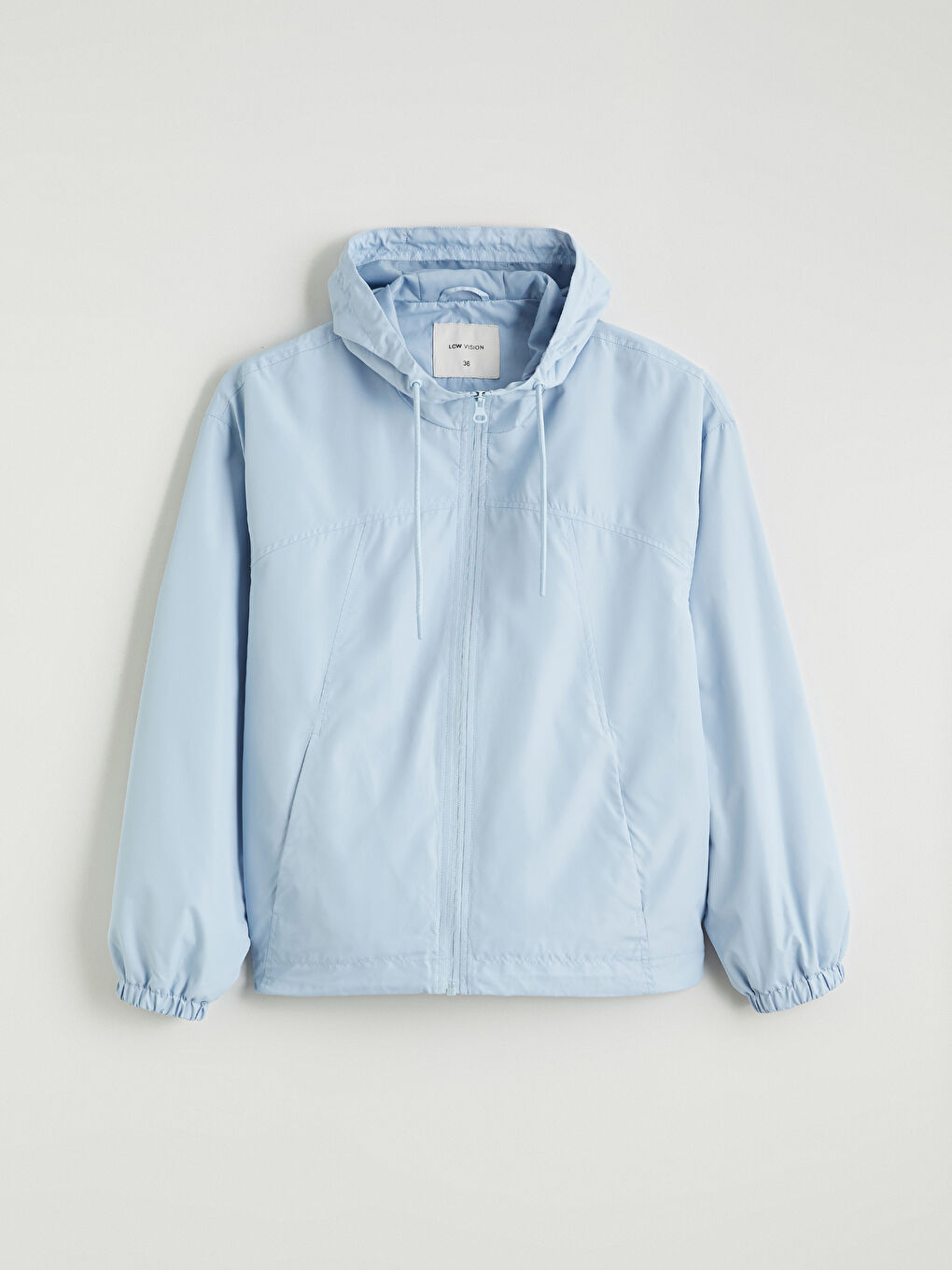 Oversized hooded raincoat for women.-5