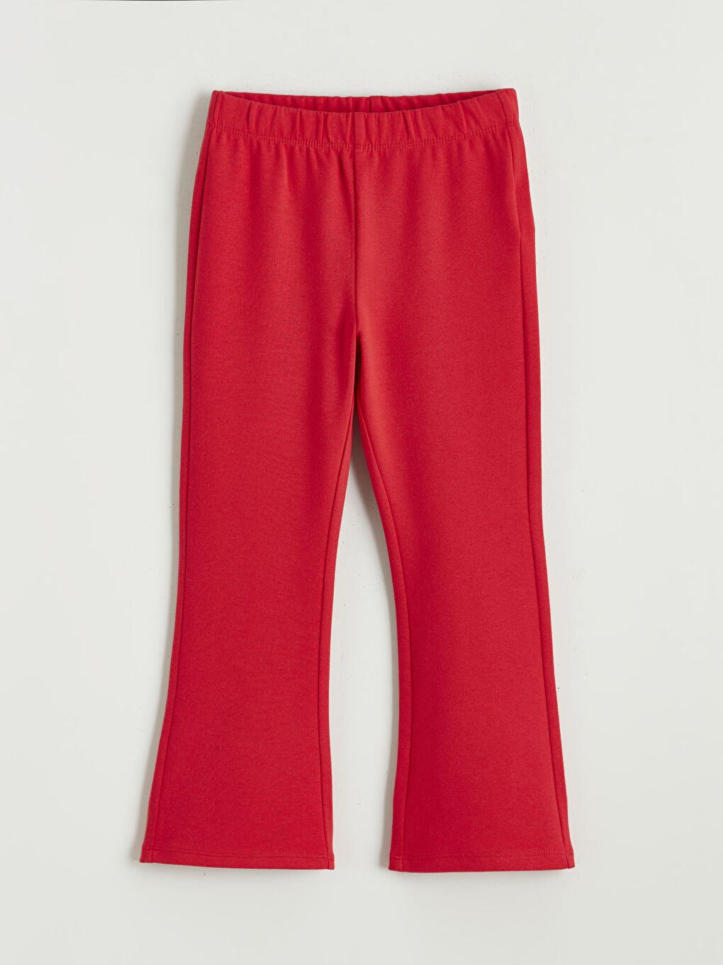 გოგონა წითელი ელასტიკი