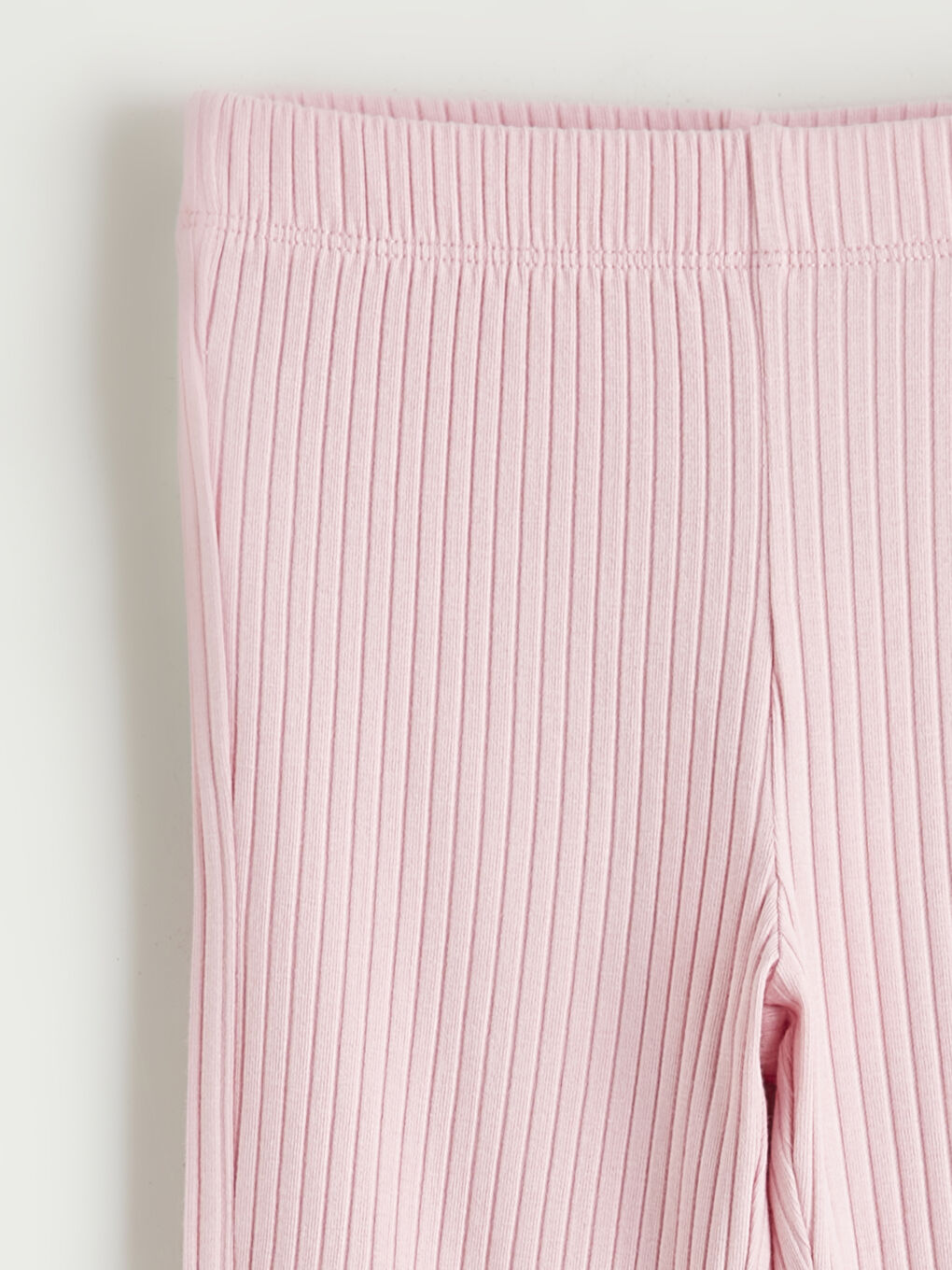 Girls' flared leggings with bow detail.-1