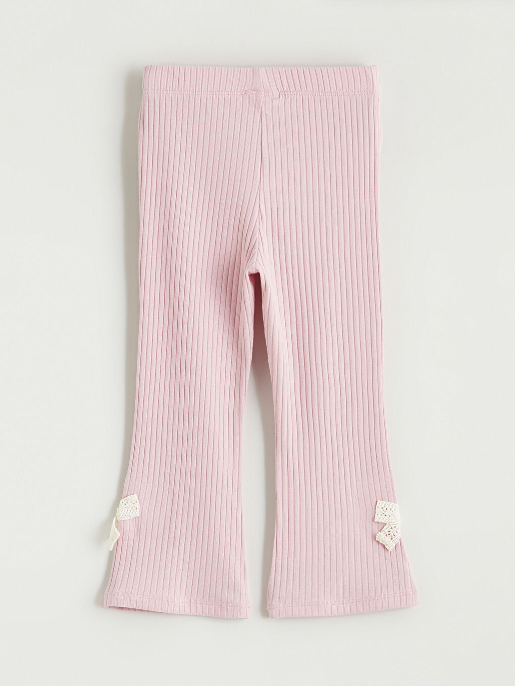 Girls' flared leggings with bow detail.-2