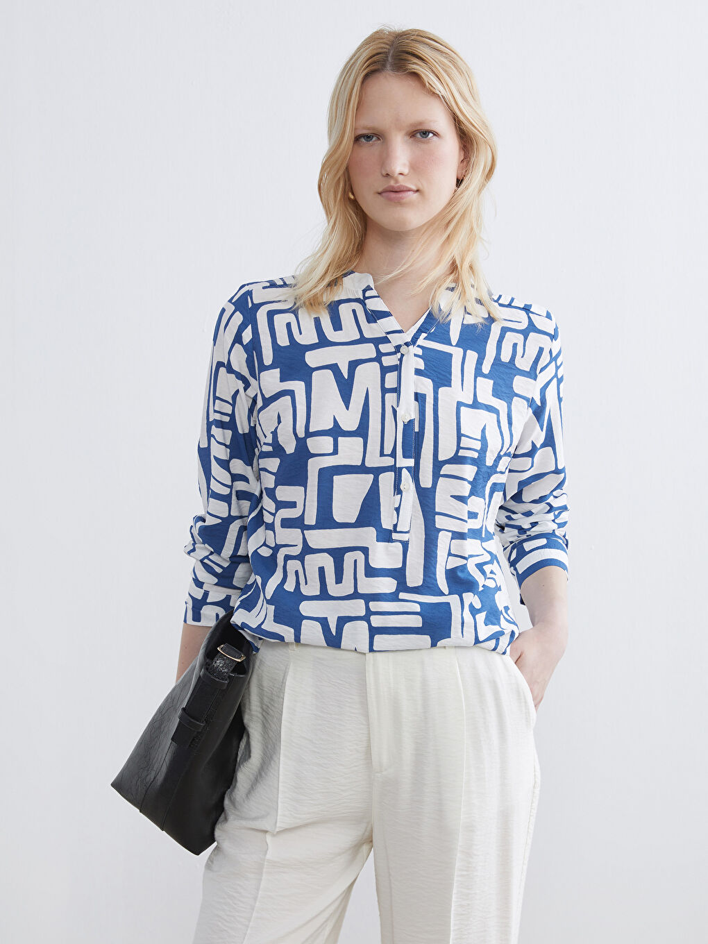 Asymmetrical Neckline Patterned Blouse