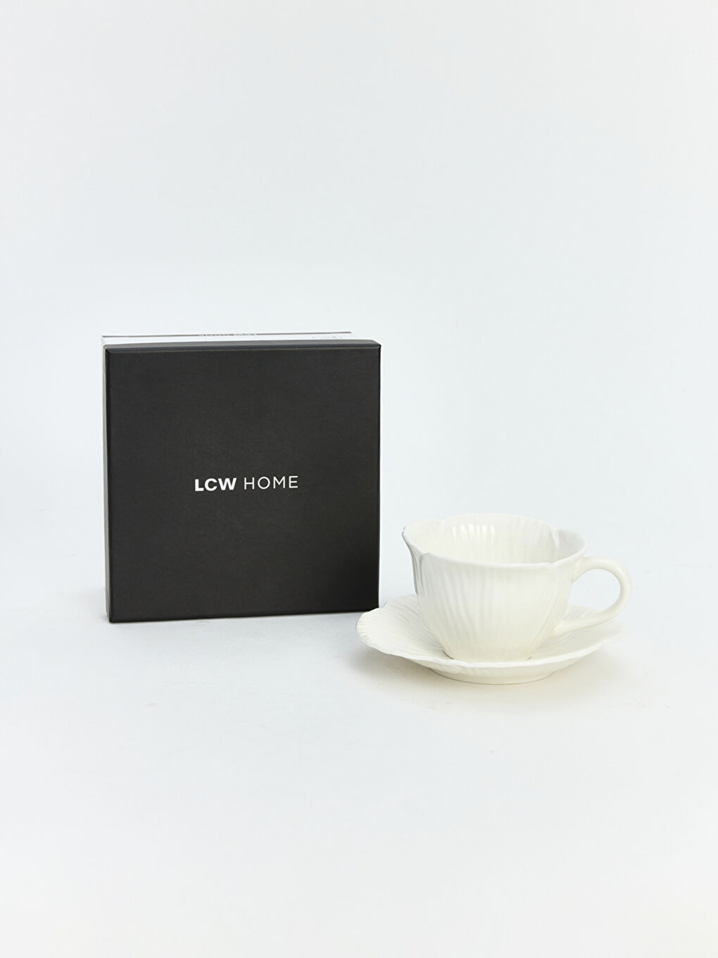 Фарфоровый набор чайных чашек-4