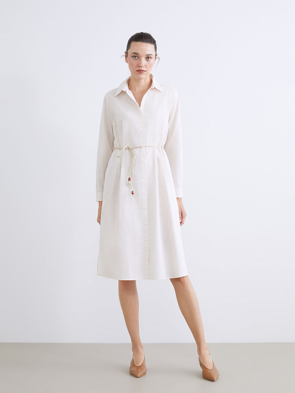 Striped belted tunic shirt.