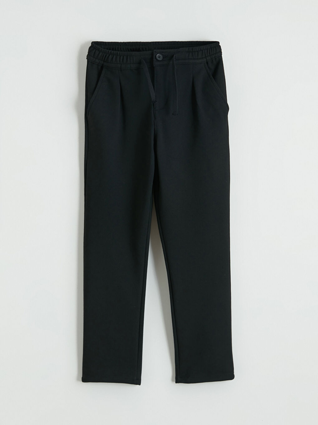 Boys' pleated trousers with elasticated waist.-1