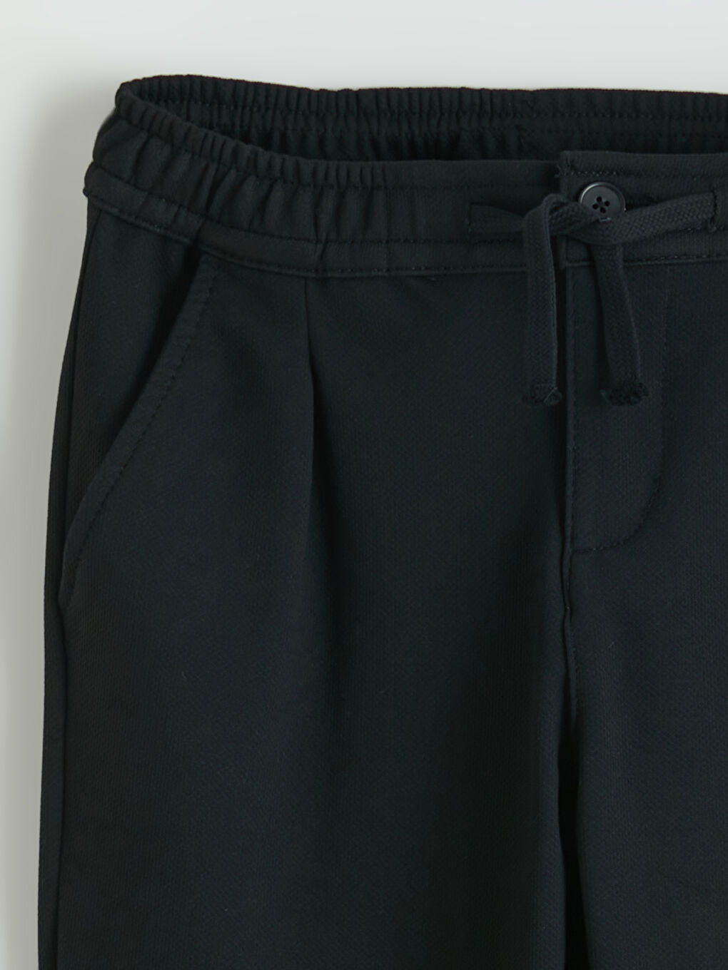 Boys' pleated trousers with elasticated waist.-2