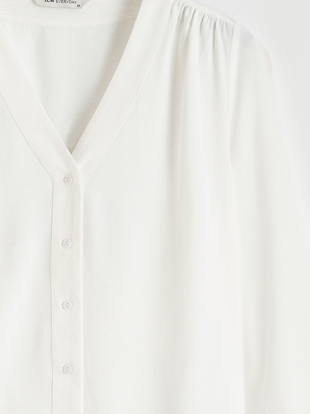 Teksturirana bluza sa V izrezom-5