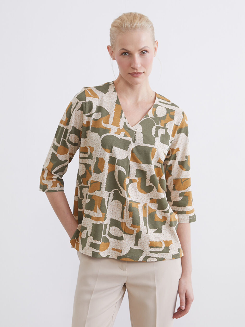 Blouse à motifs avec encolure en V pour femme