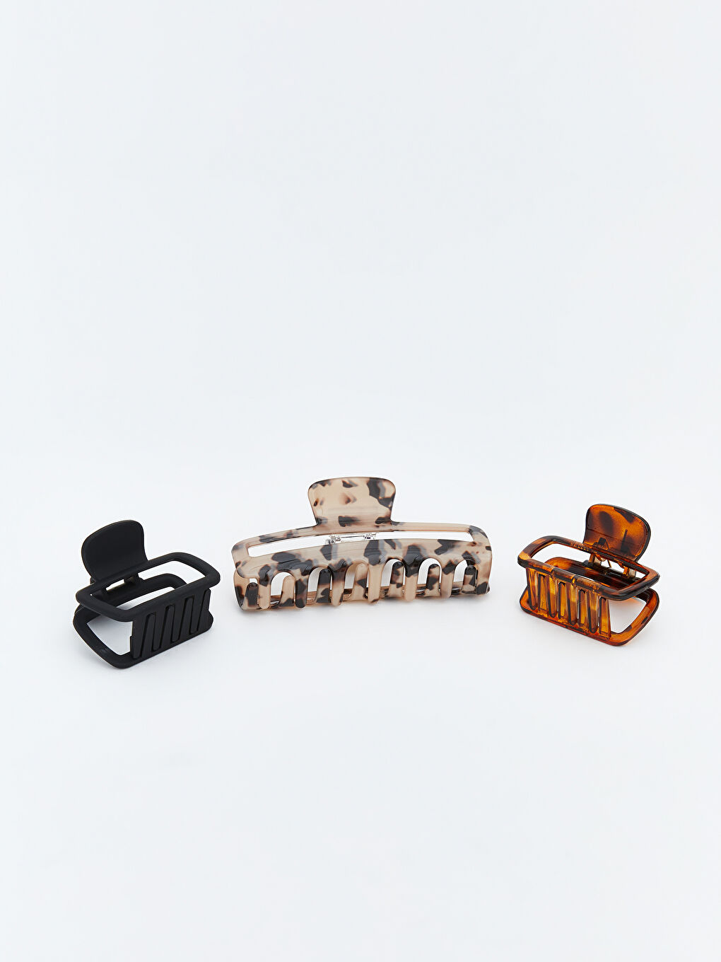 تۆقەی قژ تێكه‌ڵاو ژن