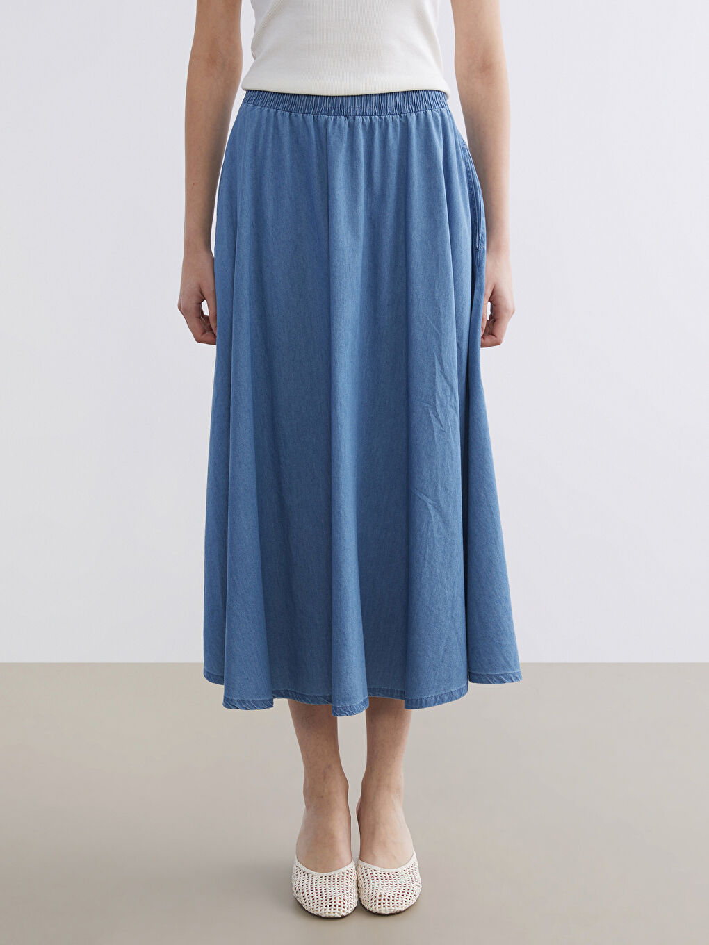 تنورة جينز أزرق امرأة-1