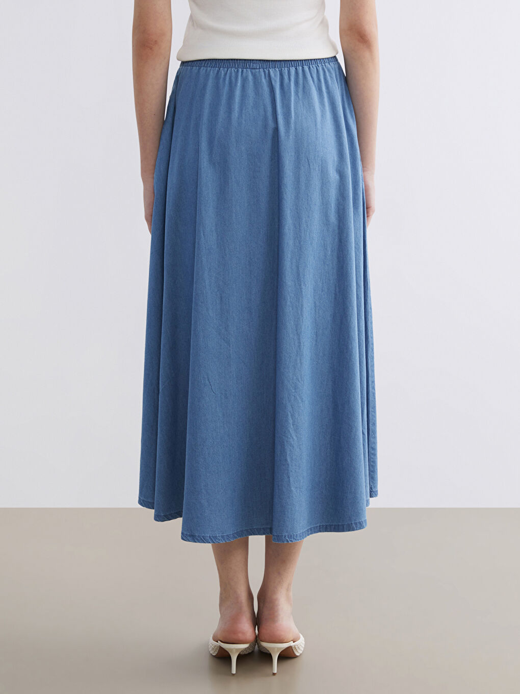 تنورة جينز أزرق امرأة-3