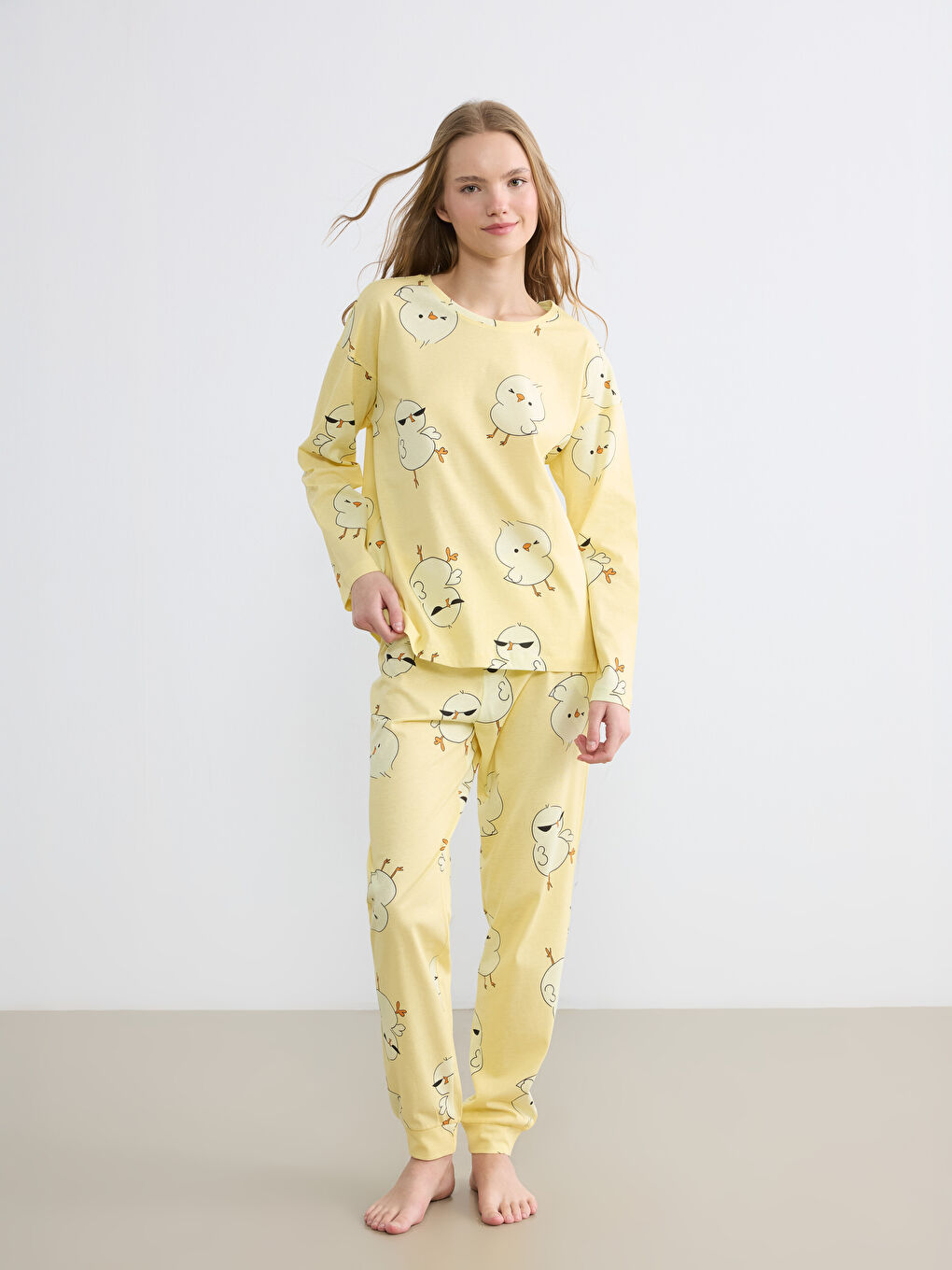 Women's patterned pajama set with a crew neck.-1